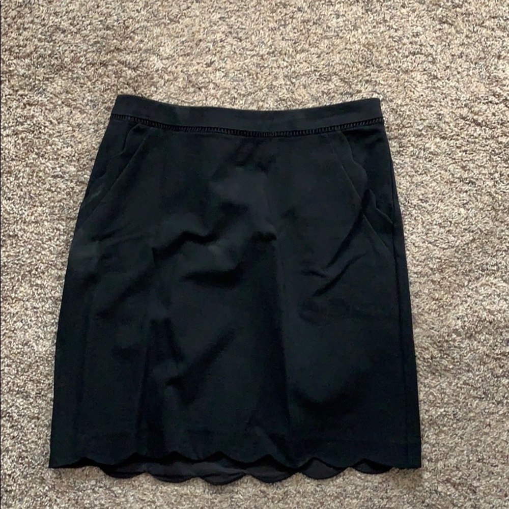 Black scalloped mini skirt